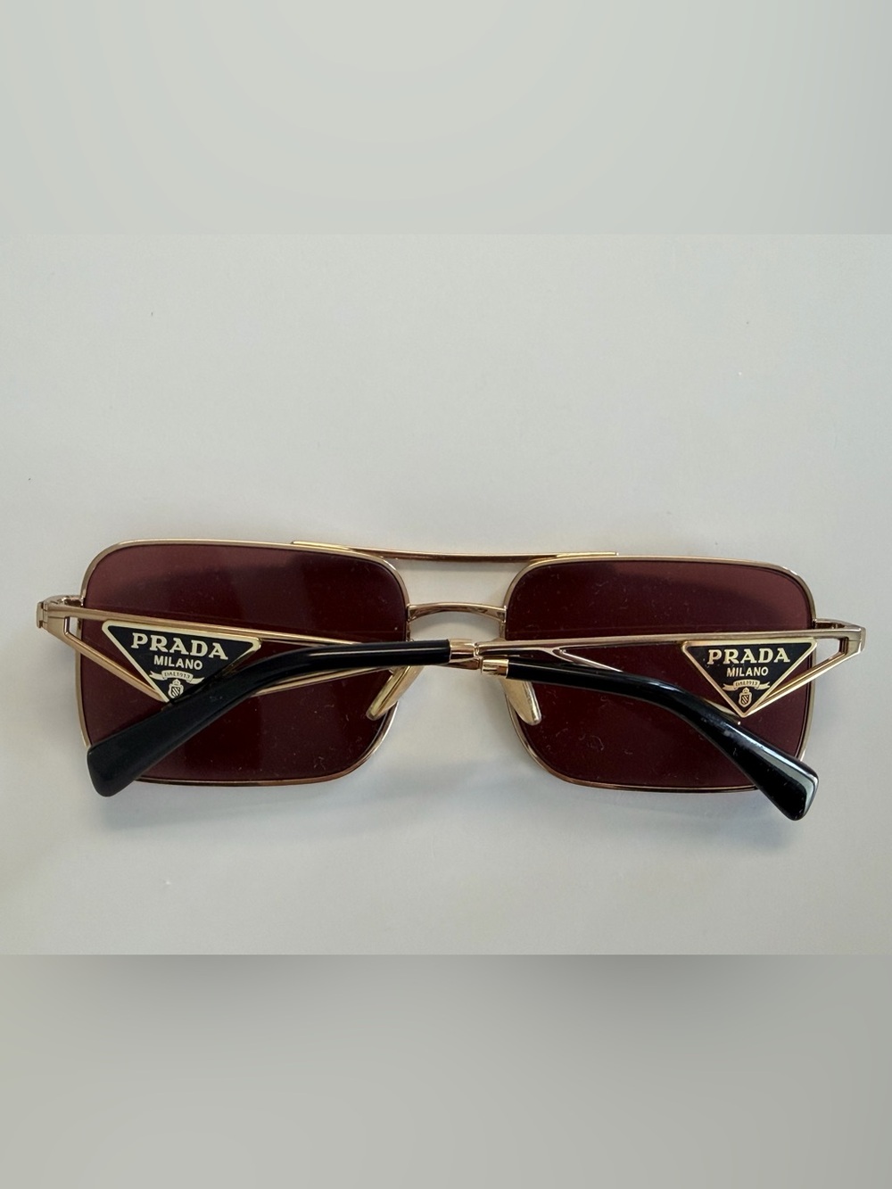 Prada Sunglasses Dark pink Lenses gold frame